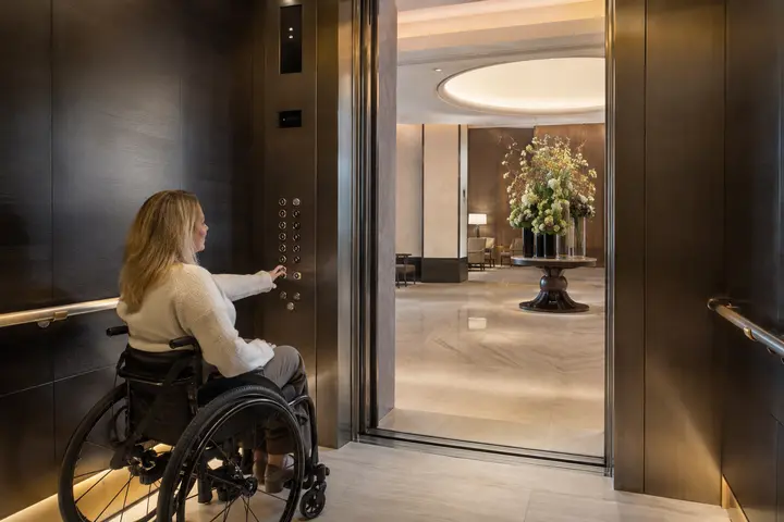Hotel elevator controls with tactile and Braille identification