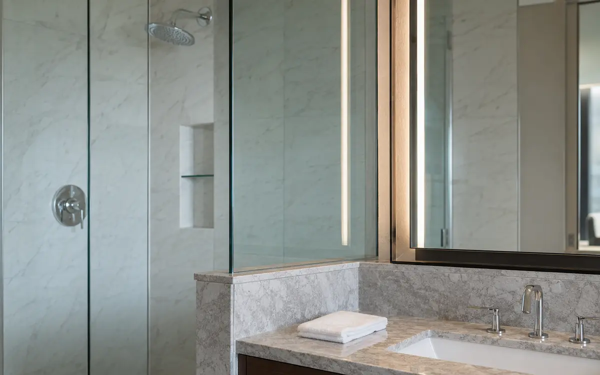 Glass and mirror surfaces prepared for compatible commercial cleaning