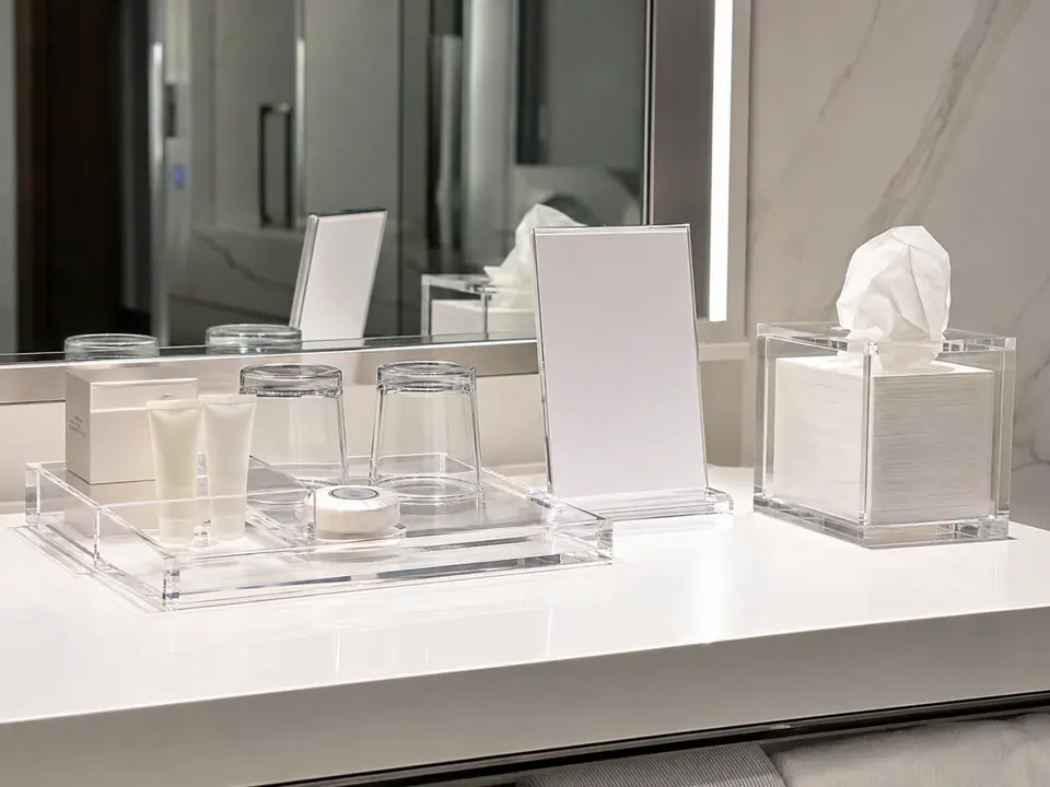 Clear acrylic hotel vanity and desk accessories