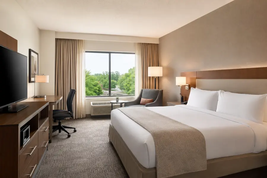 Hotel guest room refreshed with furniture for a hospitality brand conversion