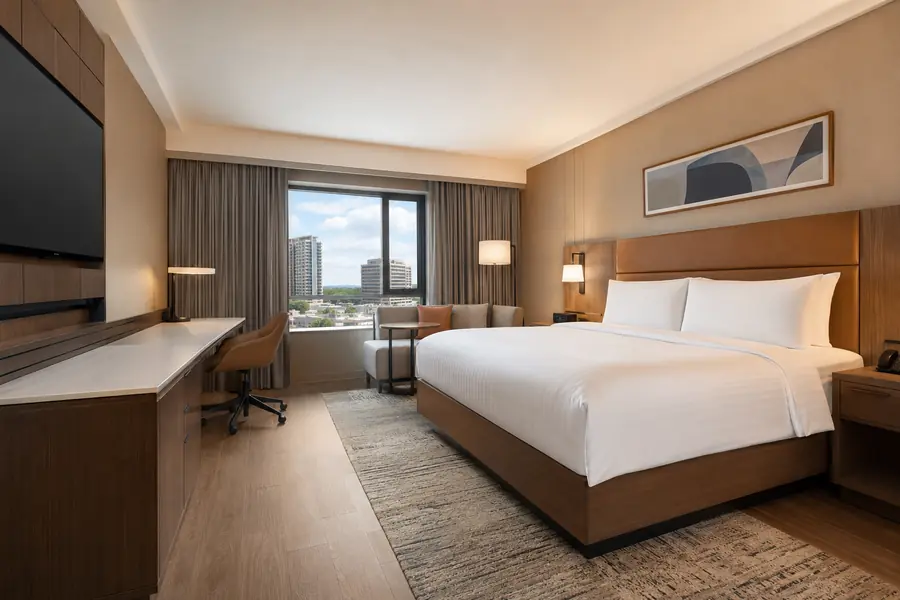 New-build hotel guest room completed with a coordinated furniture package