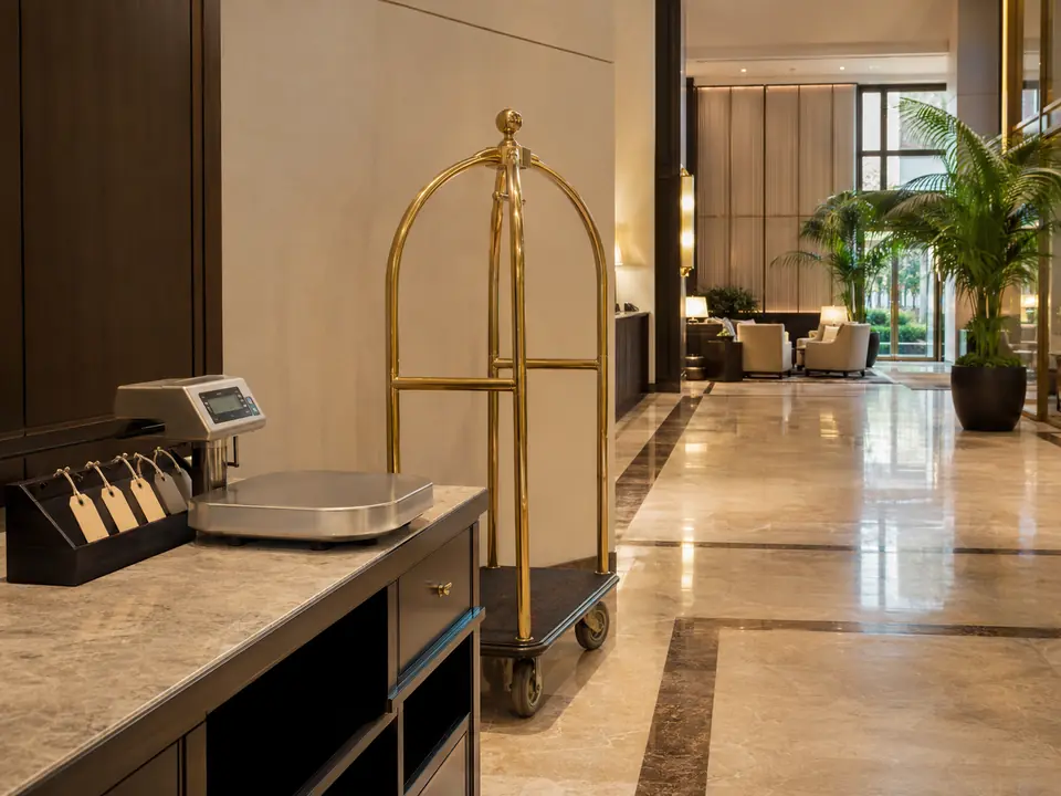 Orderly hotel bell-service luggage handling