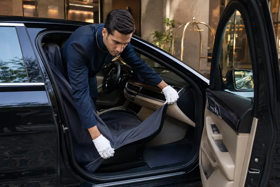 Protective seat covers and floor mats prepared for valet use